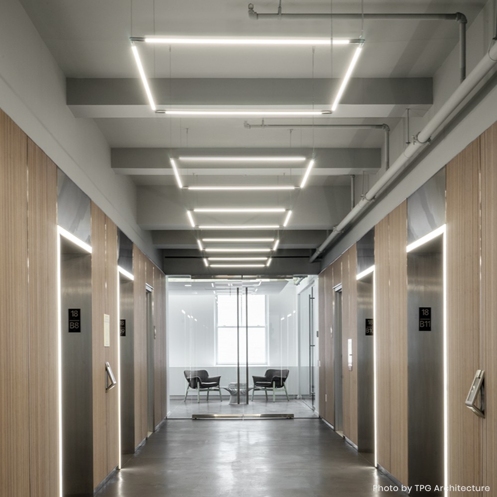 wayfinding geometric fixtures THIN Primaries juniper lighting design 75 rockefeller new office renovation