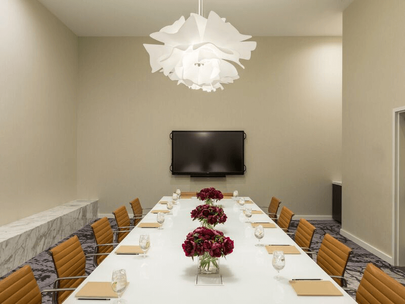Kimpton Everly Hotel Boardroom Adorned with the Love Me Not Flower Pendant